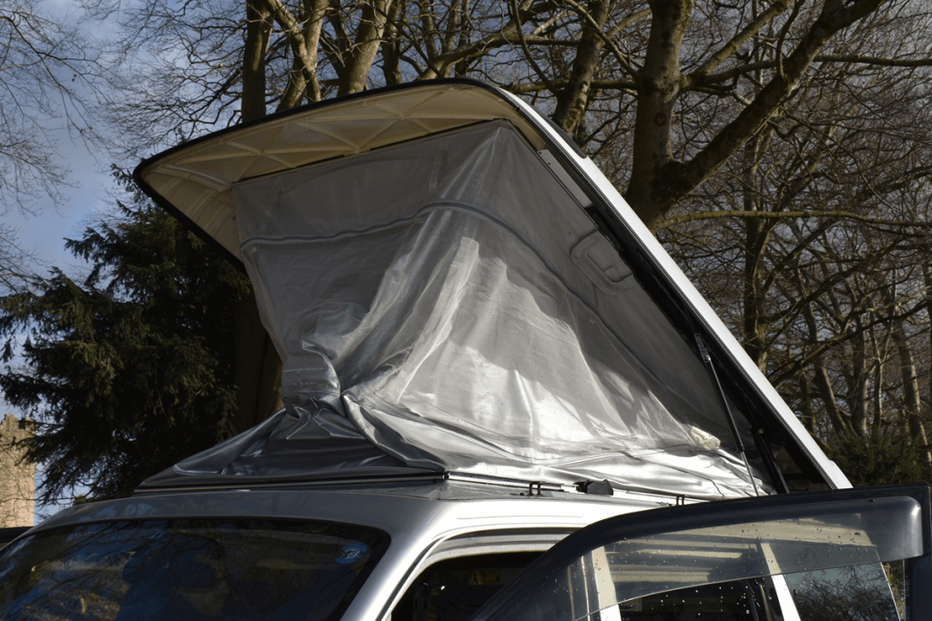 Grey colour pop-top roof on Mazda Bongo Friendee